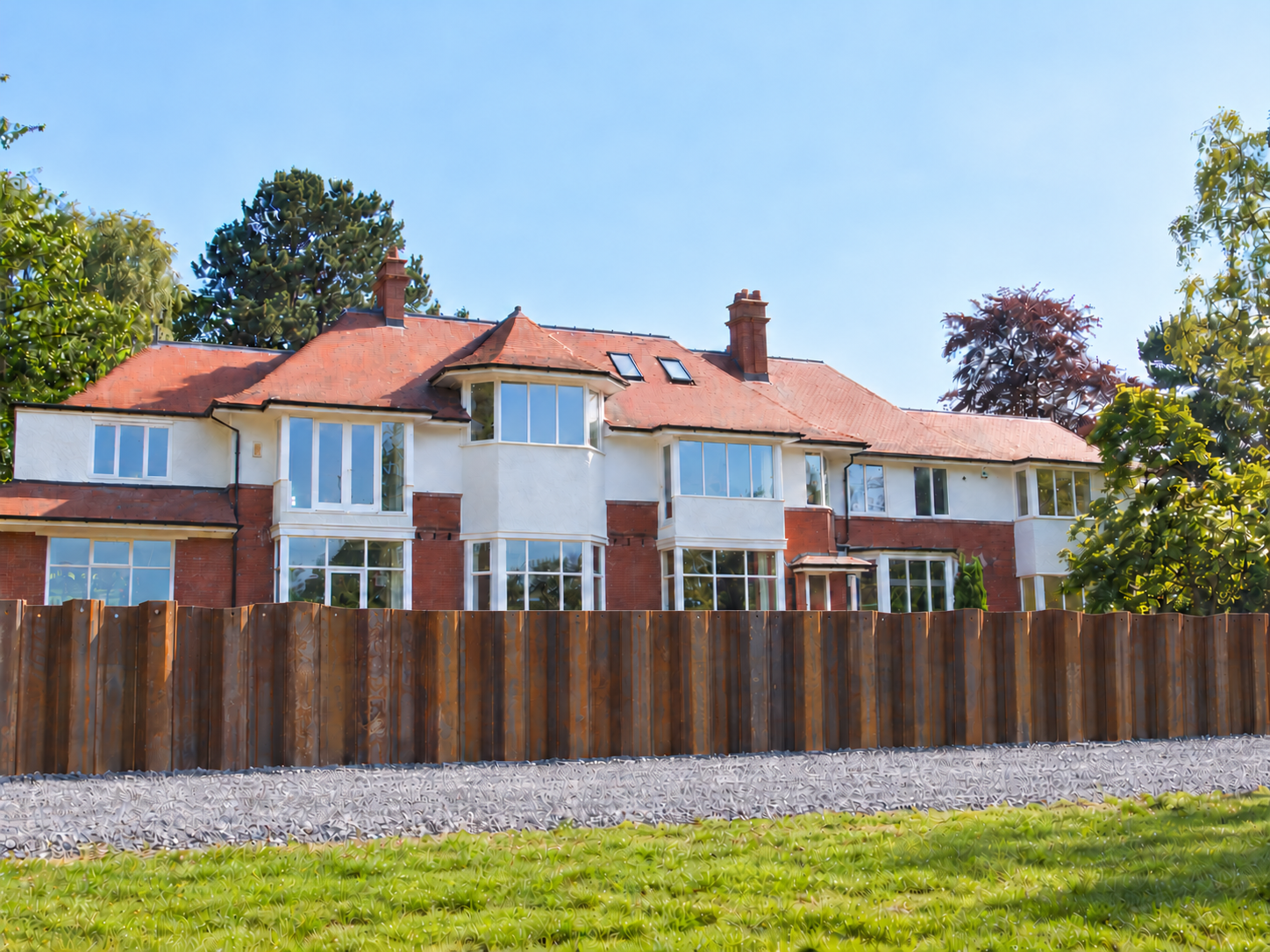 Retouched DAACE image of sheet piling beside a house